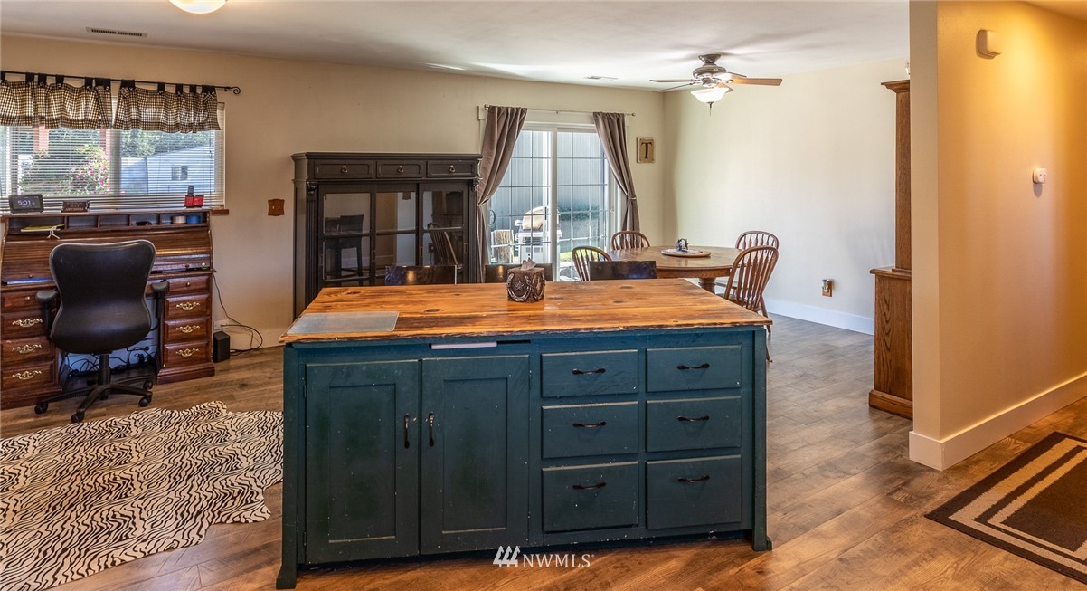 7122 Enterprise Road Ferndale, WA 98248 - Photo 12 of 33 a bed room with a bed and a dresser