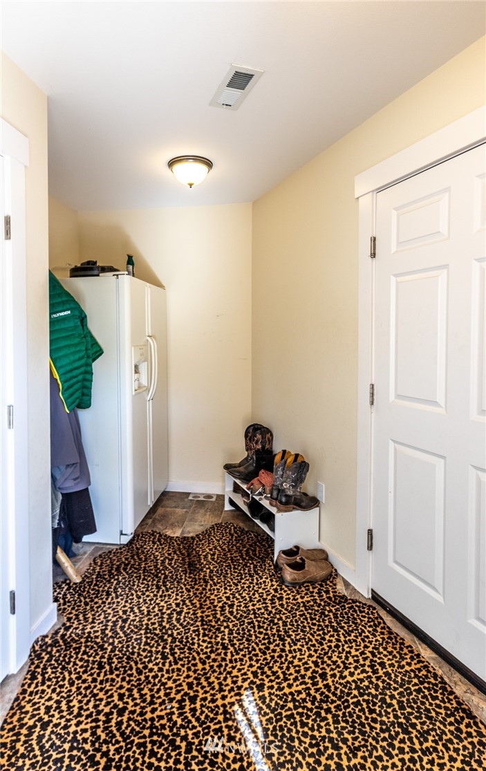 7122 Enterprise Road Ferndale, WA 98248 - Photo 23 of 33 a bedroom with a bed and a window