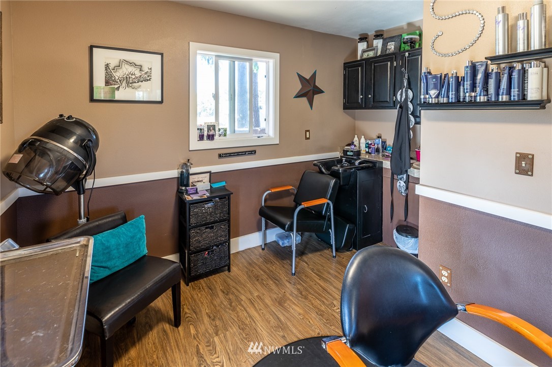 7122 Enterprise Road Ferndale, WA 98248 - Photo 26 of 33 a living room with furniture and a wooden floor