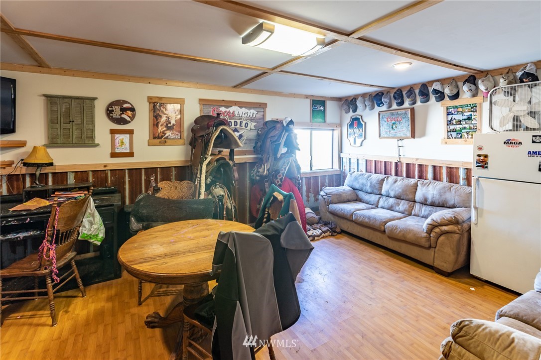 7122 Enterprise Road Ferndale, WA 98248 - Photo 30 of 33 a living room with furniture and wooden floor