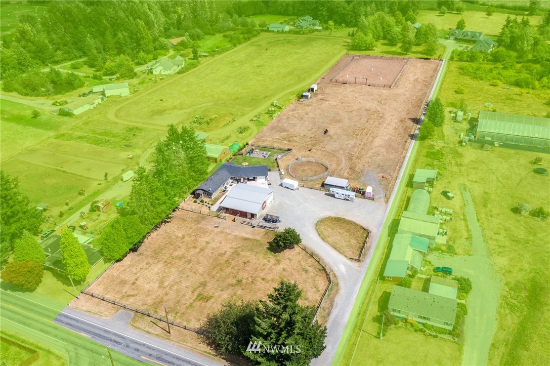 7122 Enterprise Road Ferndale, WA 98248 - Photo 4 of 33 an aerial view of a house with pool