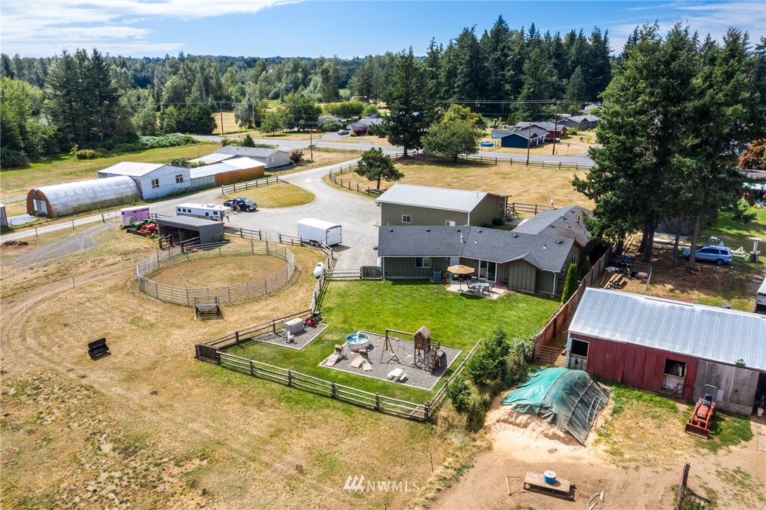 7122 Enterprise Road Ferndale, WA 98248 - Photo 31 of 33 an aerial view of a house with swimming pool garden and patio