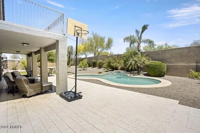 a view of a garden with patio