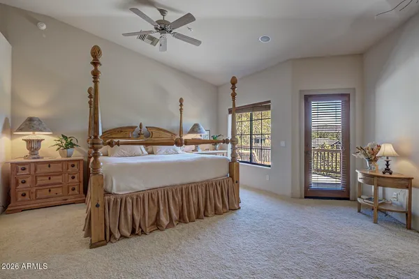 a bedroom with a bed and a cabinets