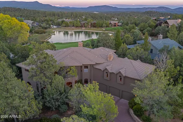 an aerial view of a house with a garden view