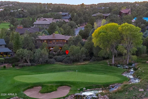 a view of a house with a big yard