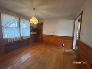 11 Edgewood Road Portland, CT 06480 - Photo 13 of 17 a room with wooden floor and window
