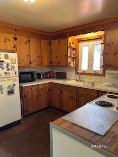 11 Edgewood Road Portland, CT 06480 - Photo 16 of 17 a kitchen with stainless steel appliances kitchen island granite countertop a sink a stove a refrigerator with grey cabinets and wooden floor
