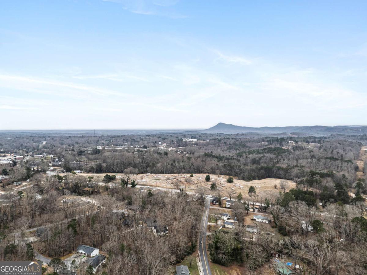 91 Remsdale Street, Unit 9 Toccoa, GA 30577 - Photo 2 of 5 an aerial view of mountain with trees