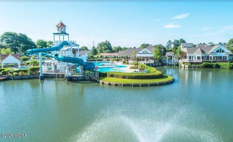116 Tivoli Park Road Centerville, GA 31028 - Photo 28 of 33 a view of a lake with houses