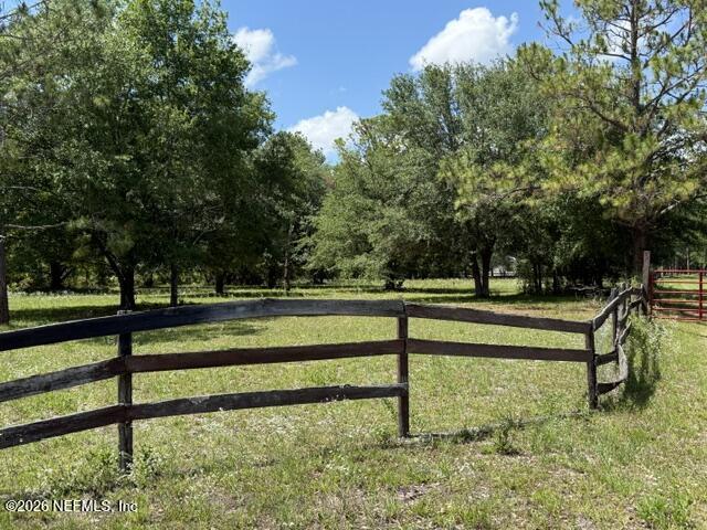 5214 Carter Spencer Road Middleburg, FL 32068 - Photo 7 of 50 a view of backyard with large trees
