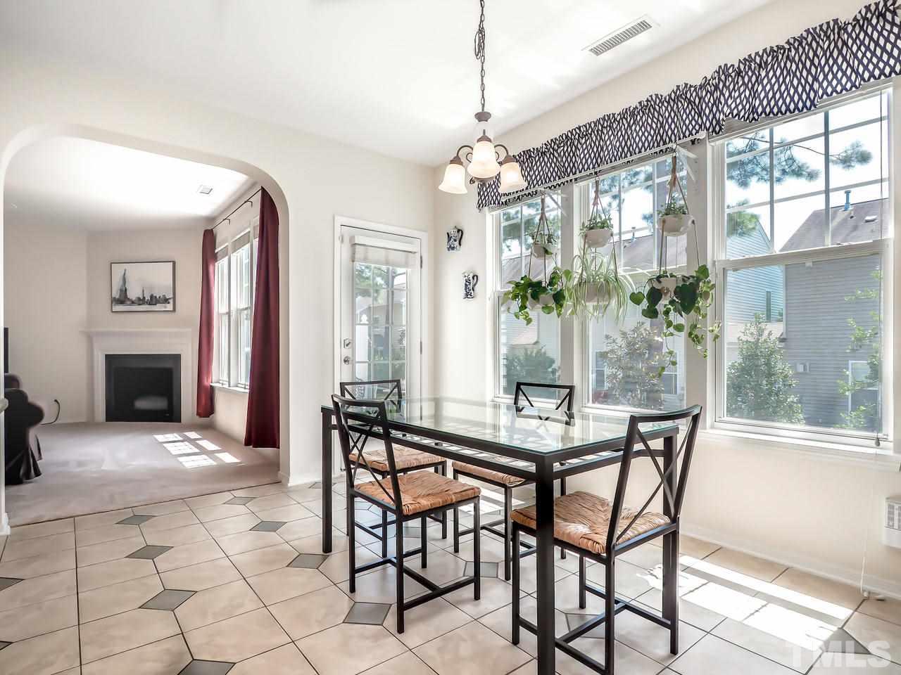 8507 Flying Buttress Drive Raleigh, NC 27613 - Photo 18 of 27 Look at all this natural light coming in. This is such a great space for family meals or homework! :)