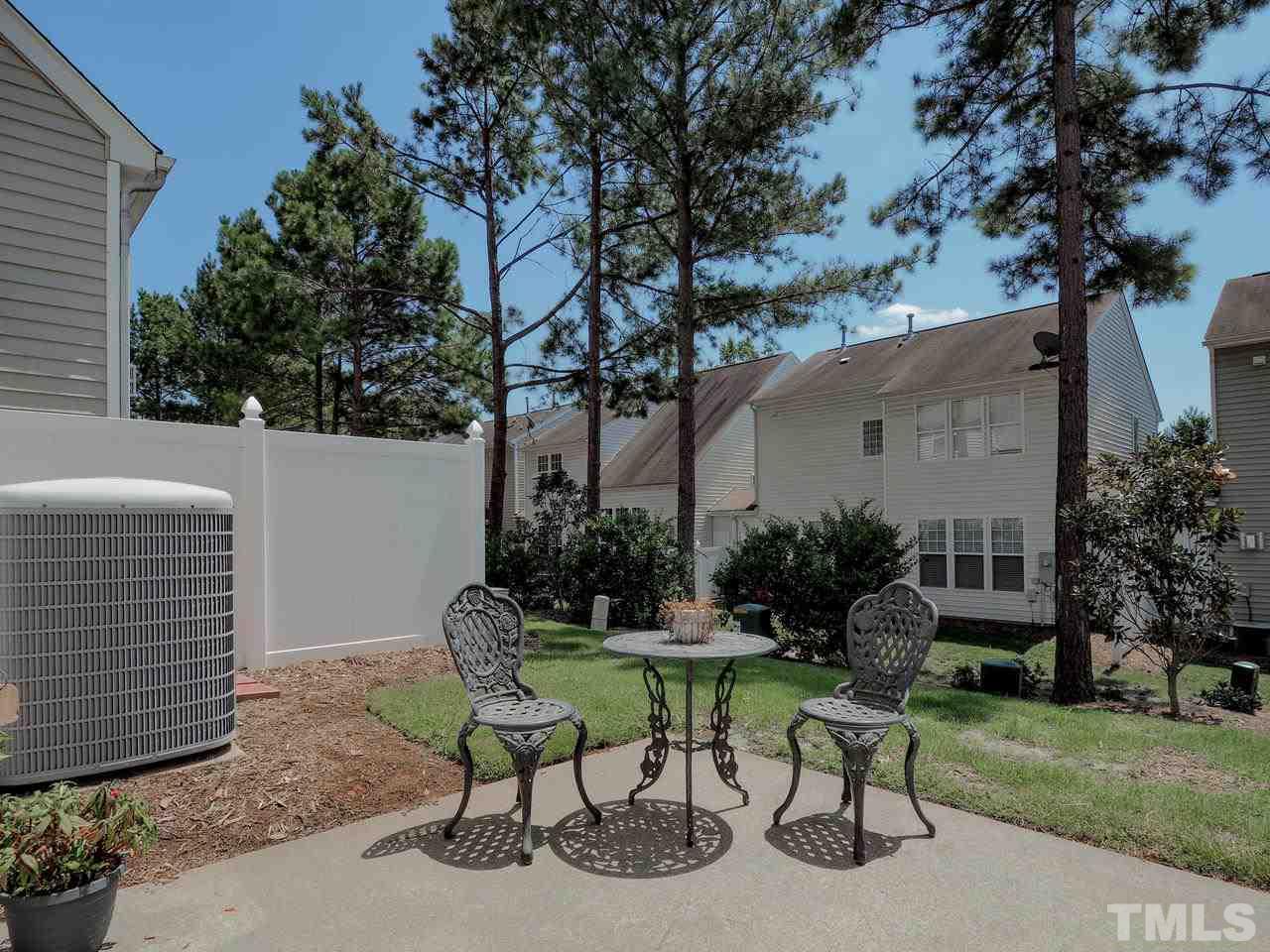 8507 Flying Buttress Drive Raleigh, NC 27613 - Photo 20 of 27 Lovely patio space with a green backyard!