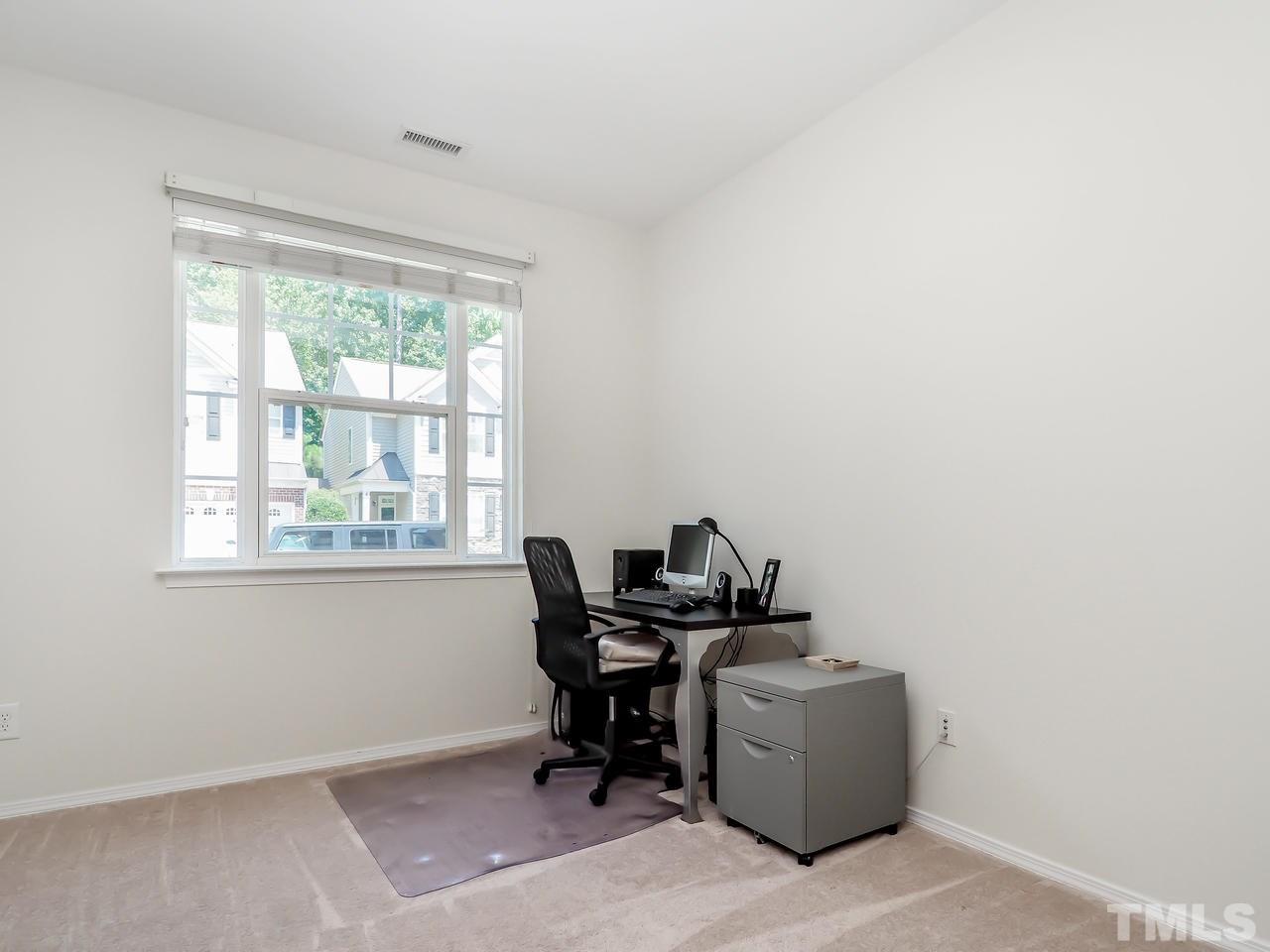 8507 Flying Buttress Drive Raleigh, NC 27613 - Photo 8 of 27 A great space downstairs that can be used as an office, a den, kids / play area or anything your heart desires. Just off the entryway!