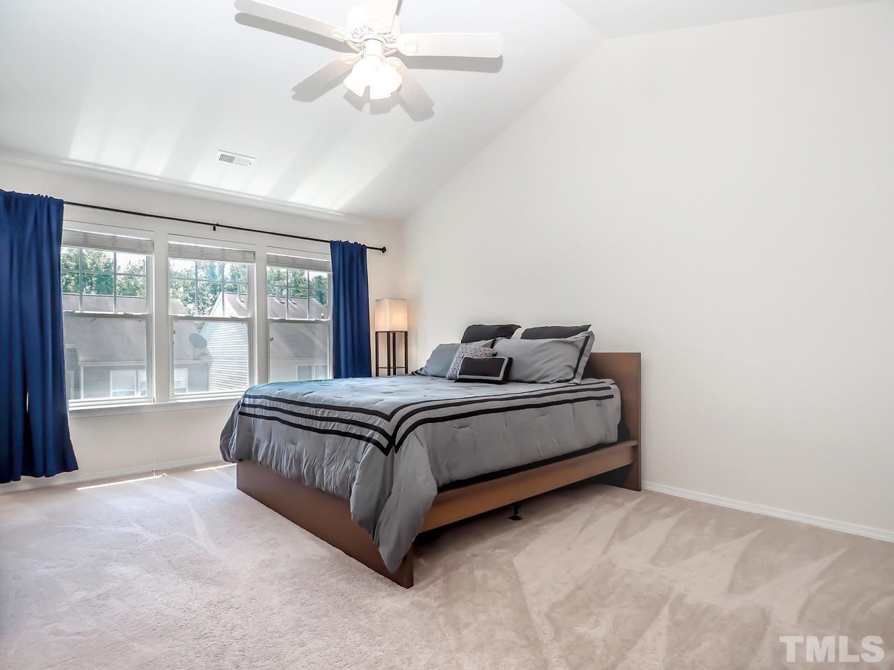 8507 Flying Buttress Drive Raleigh, NC 27613 - Photo 9 of 27 A huge master bedroom with cathedral ceilings allow enough space for a nice sitting area without leaving your private quarters.