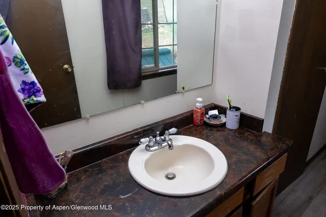 view of living room with furniture and a window