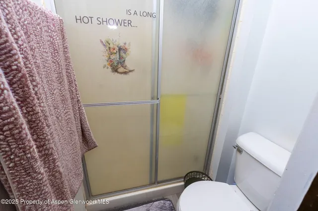 a dining room with furniture and a fireplace