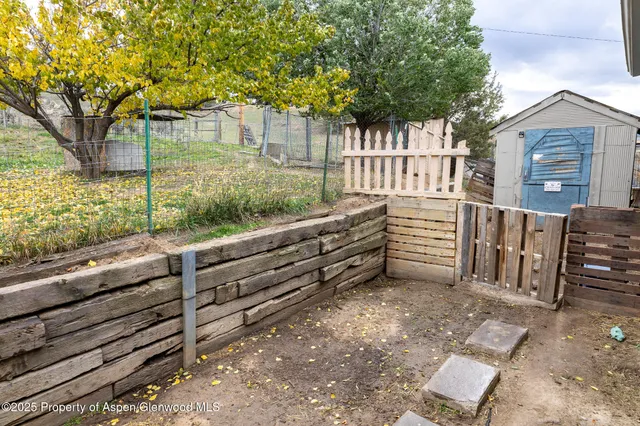 a yellow house with a outdoor space