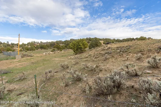 a view of a lake with mountains in the background