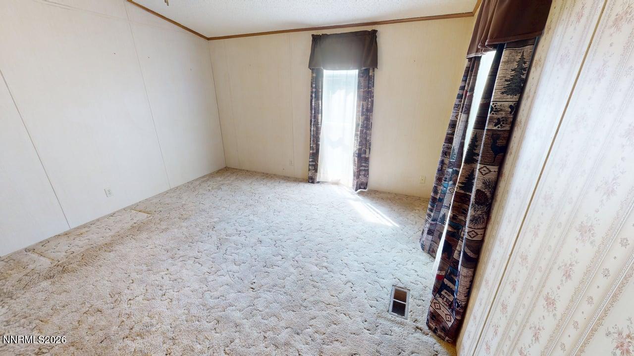 310 Bastian Road Battle Mountain, NV 89820 - Photo 26 of 32 Primary Bedroom