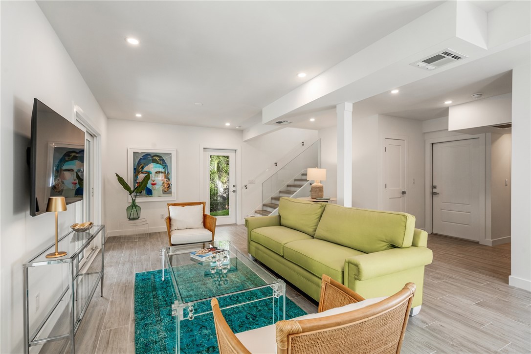 1881 Pebble Path Vero Beach, FL 32963 - Photo 18 of 34 a living room with furniture and a wooden floor
