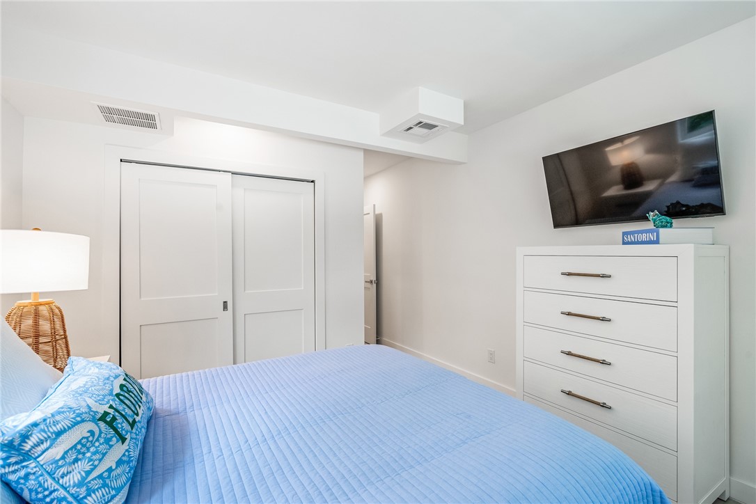 1881 Pebble Path Vero Beach, FL 32963 - Photo 22 of 34 a view of a bedroom with a flat screen tv