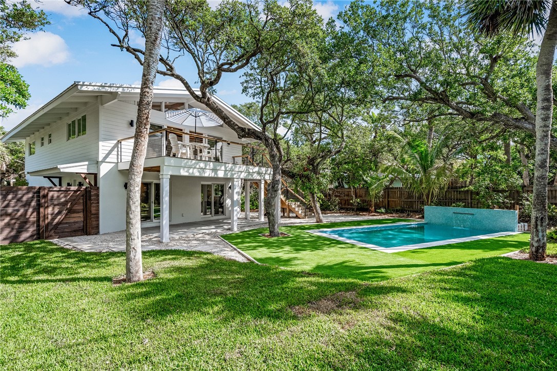 1881 Pebble Path Vero Beach, FL 32963 - Photo 29 of 34 a view of a house with a yard and a tree