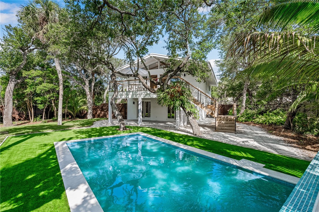 1881 Pebble Path Vero Beach, FL 32963 - Photo 3 of 34 a view of a house with a yard patio and fire pit