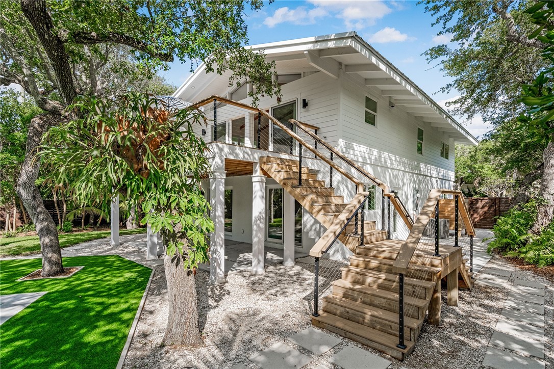 1881 Pebble Path Vero Beach, FL 32963 - Photo 4 of 34 a view of a house with a yard
