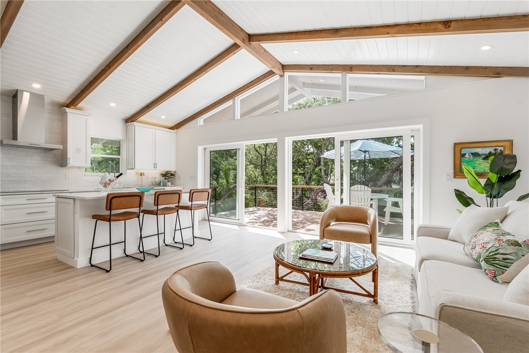 1881 Pebble Path Vero Beach, FL 32963 - Photo 6 of 34 a living room with furniture and floor to ceiling windows