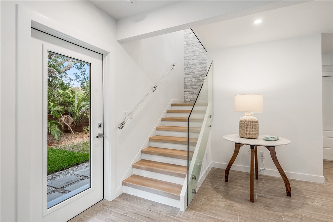 1881 Pebble Path Vero Beach, FL 32963 - Photo 7 of 34 a view of entryway with wooden floor