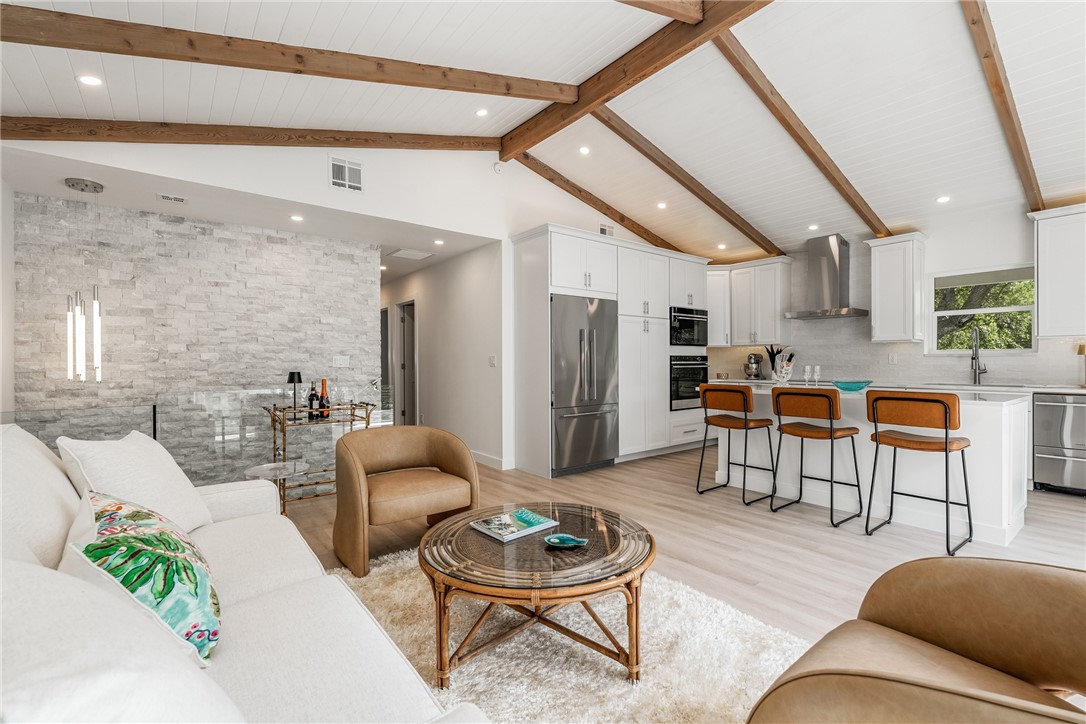 1881 Pebble Path Vero Beach, FL 32963 - Photo 8 of 34 a living room with furniture and kitchen view