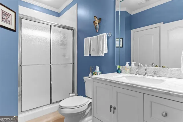 a bed room with a bed and a television