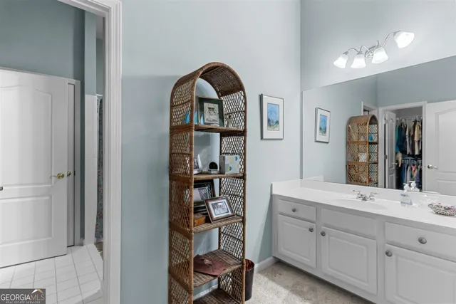 a bathroom with a toilet and a sink