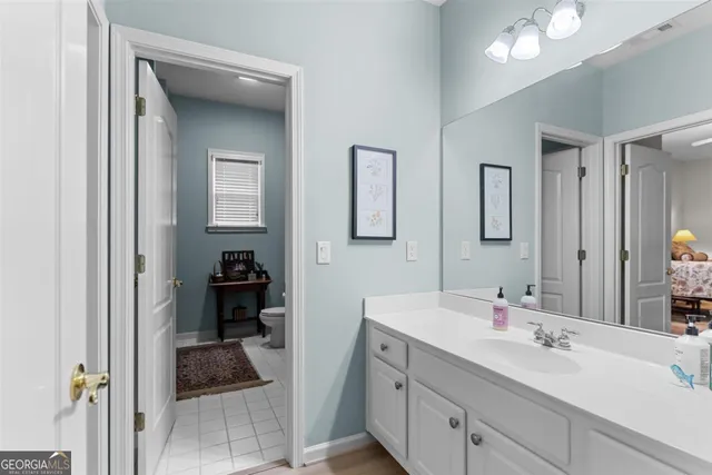 a bed room with a bed and a table