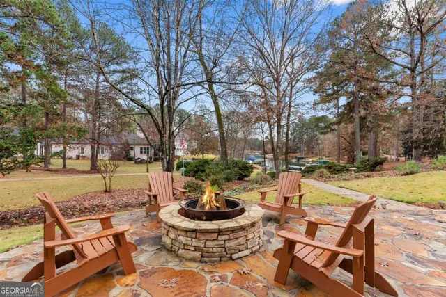 a view of lake with yard