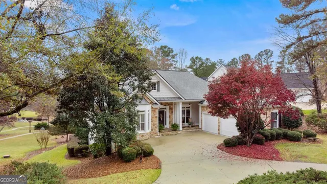 a front view of a house with a porch