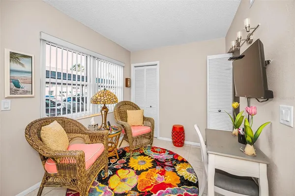 a living room with furniture and a window