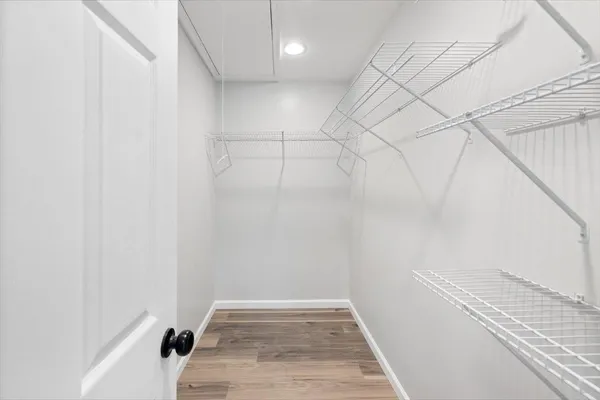 a view of a room with racks on the wall