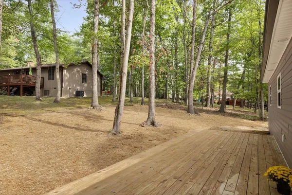 a house with trees in front of it