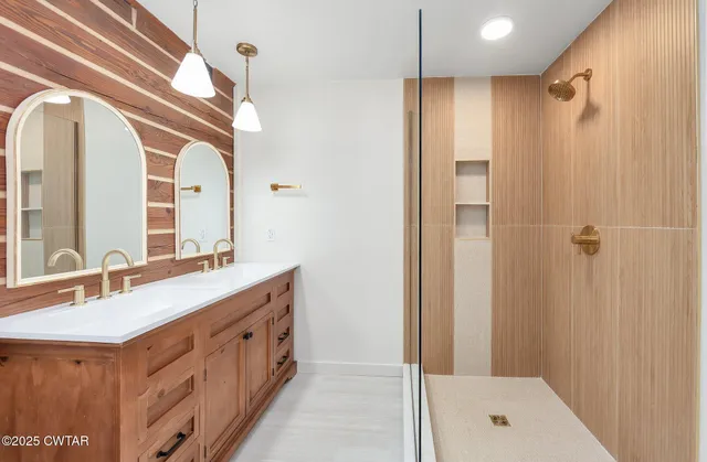 a room with a dresser and a window