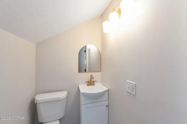 a view of a balcony with wooden floor