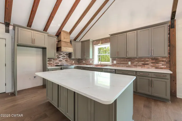 a view of empty room with windows