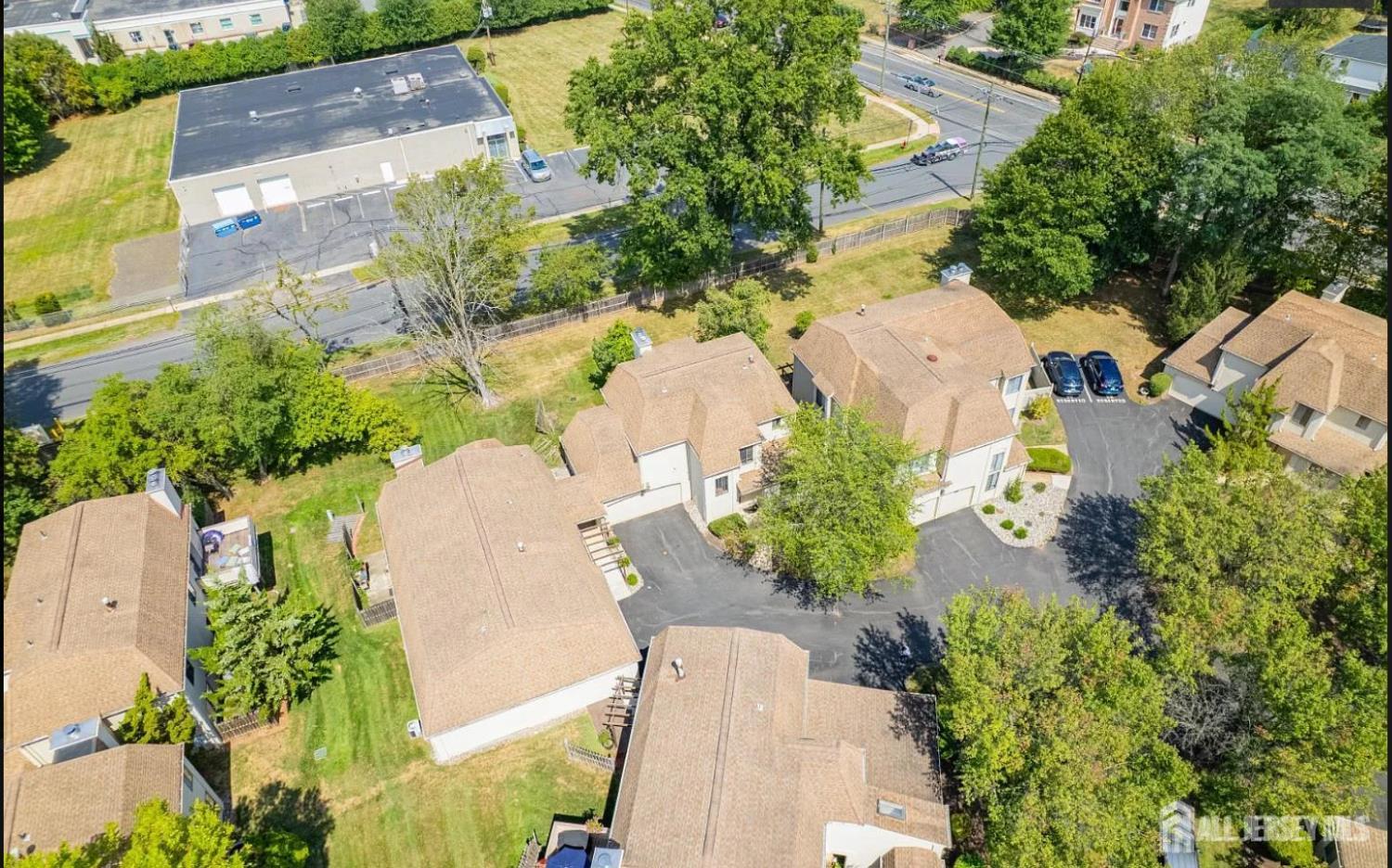 31 Gate House Lane Edison, NJ 08820 - Photo 2 of 15 an aerial view of a house with a yard and a outdoor seating