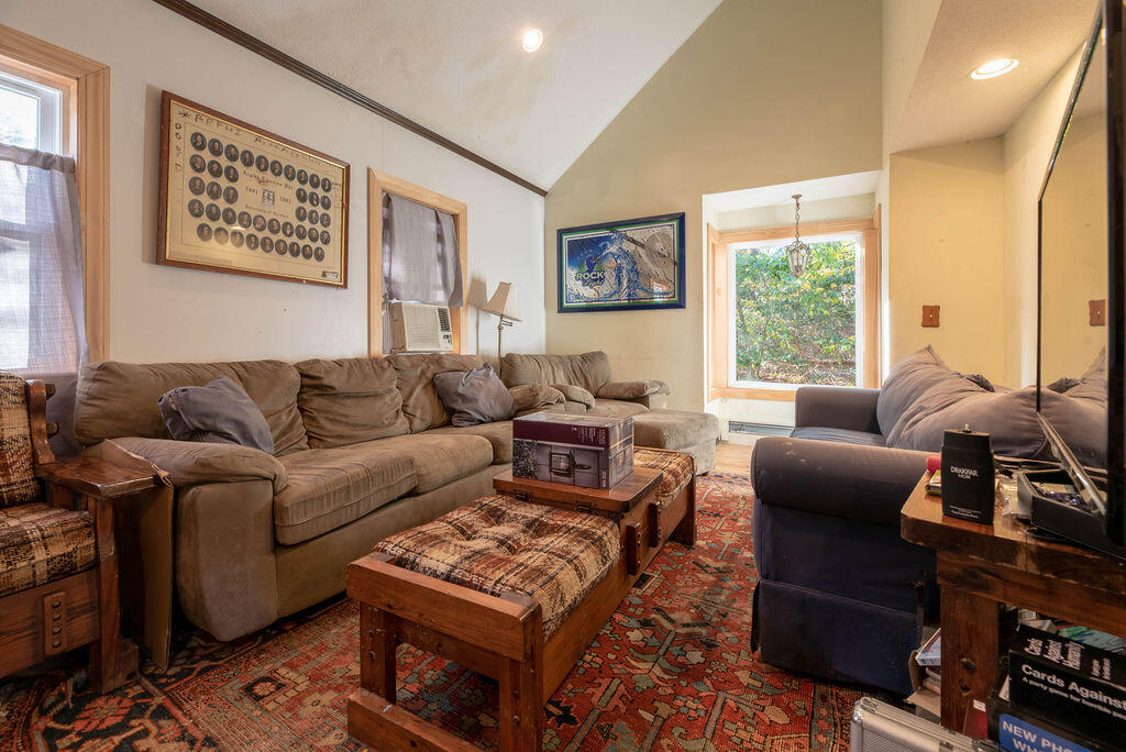 44 Deerfield Road Mashpee, MA 02649 - Photo 3 of 17 a living room with furniture and a window