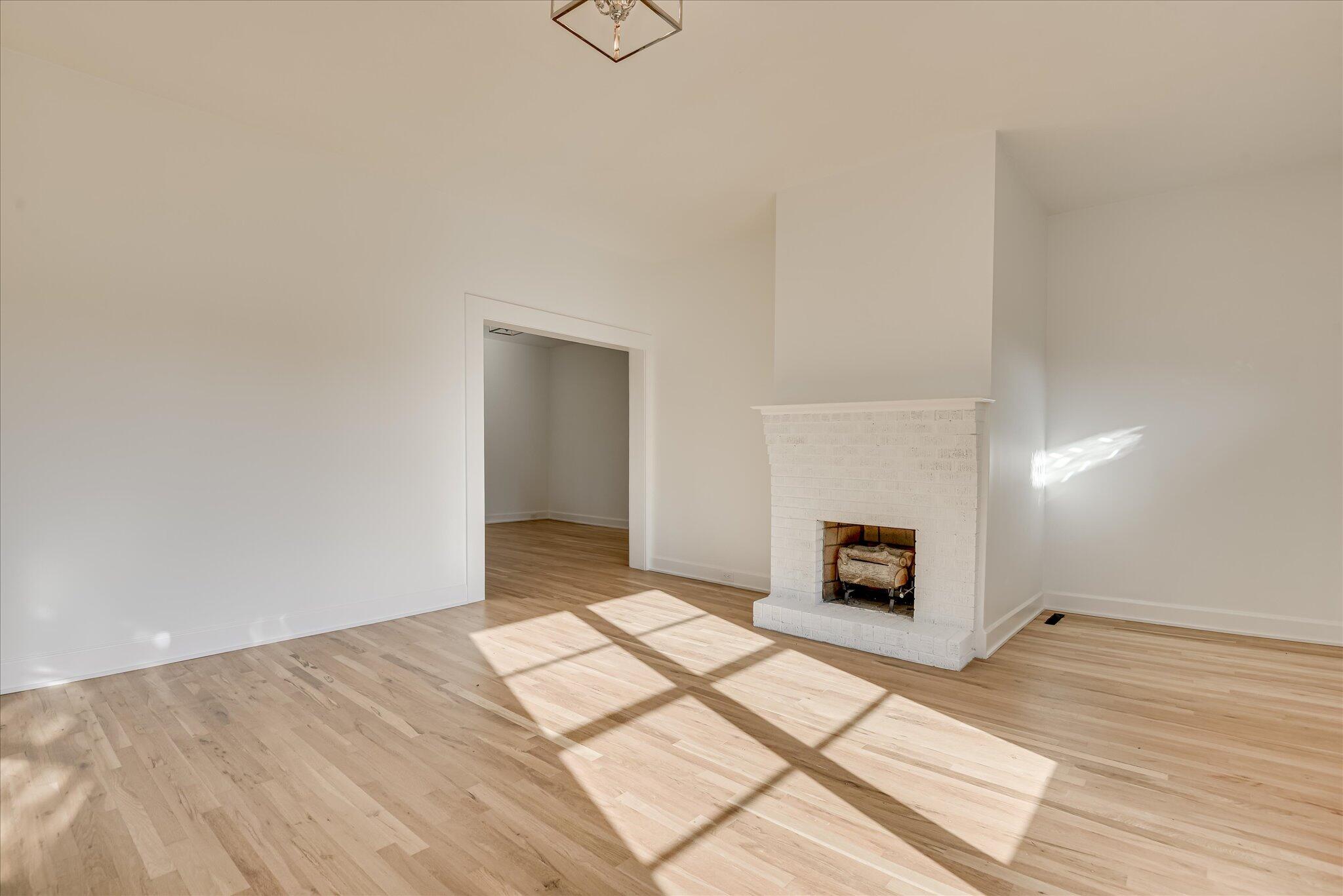 126 Mosley Road Aiken, SC 29801 - Photo 3 of 29 a view of an empty room and fire place
