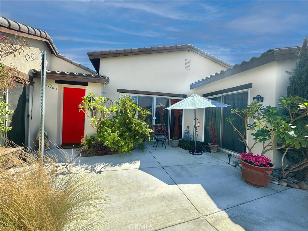 39995 Alba Way Palm Desert, CA 92211 - Photo 11 of 44 a house view with a outdoor space