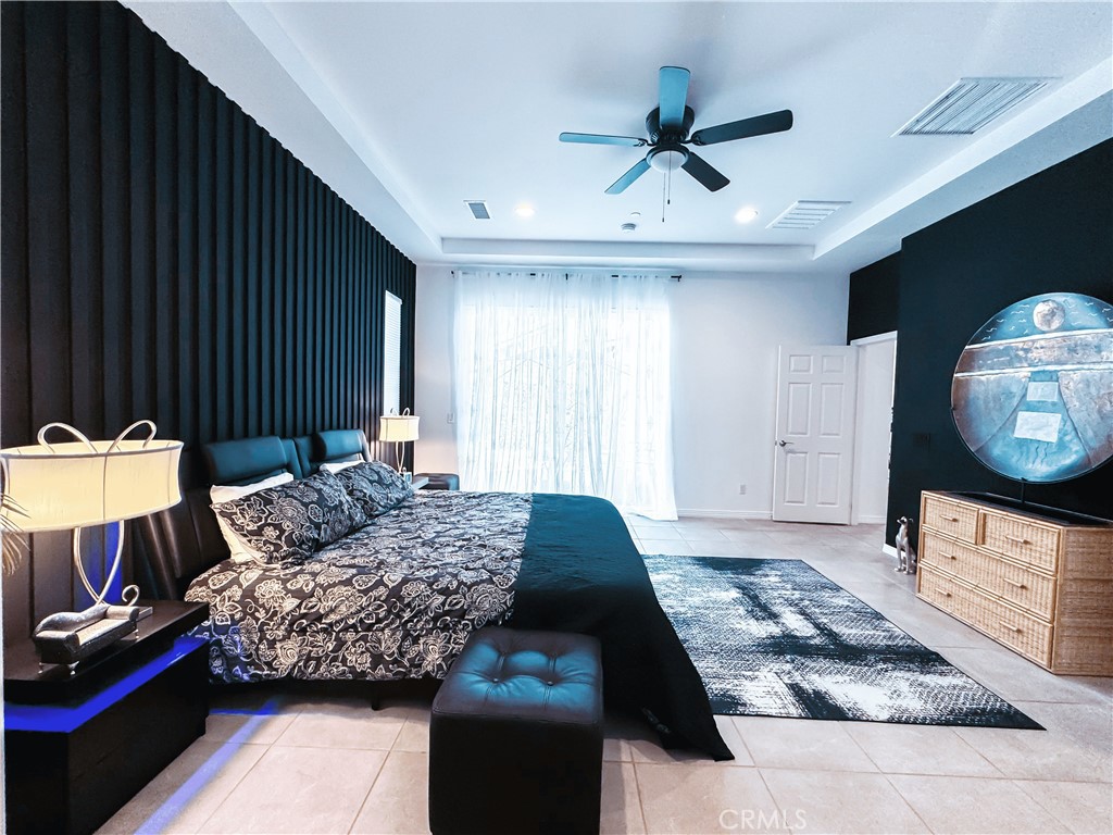 39995 Alba Way Palm Desert, CA 92211 - Photo 25 of 44 a living room with furniture and a wooden floor