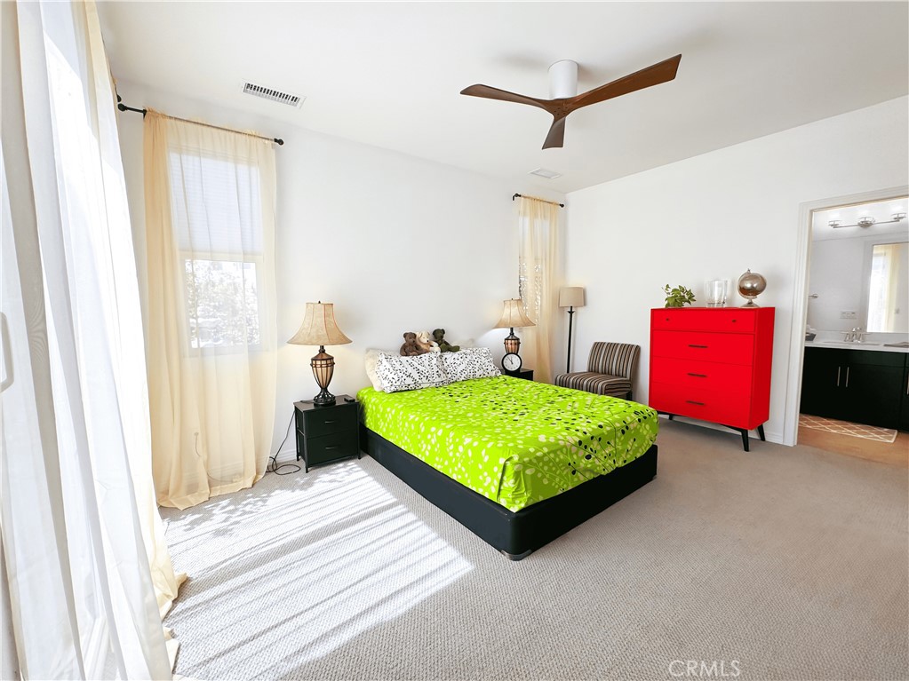 39995 Alba Way Palm Desert, CA 92211 - Photo 31 of 44 a bedroom with a bed and a window