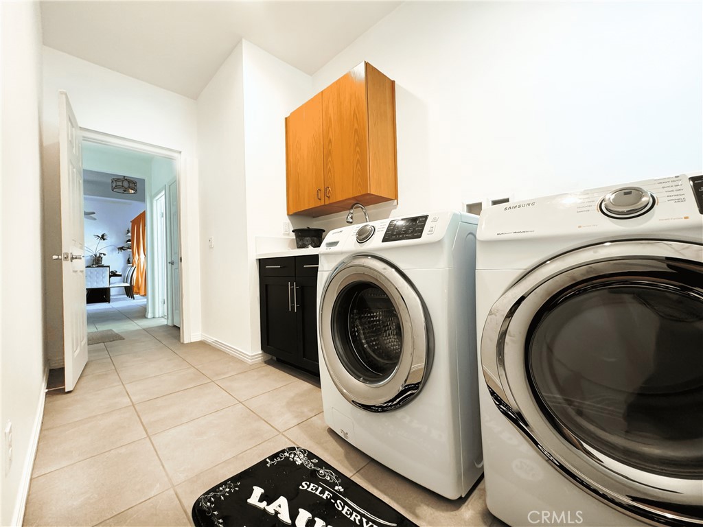 39995 Alba Way Palm Desert, CA 92211 - Photo 35 of 44 a view of a storage & utility room with washer and dryer